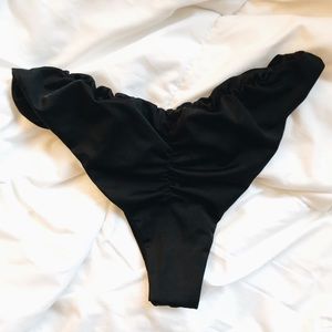 Cheeky black bikini bottoms